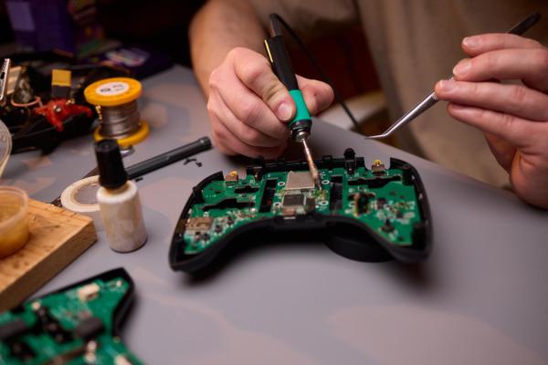 Réparation manette console